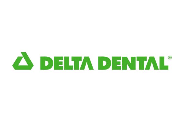 The Delta Dental logo consisting of a green triangle icon followed by the brand name in green.